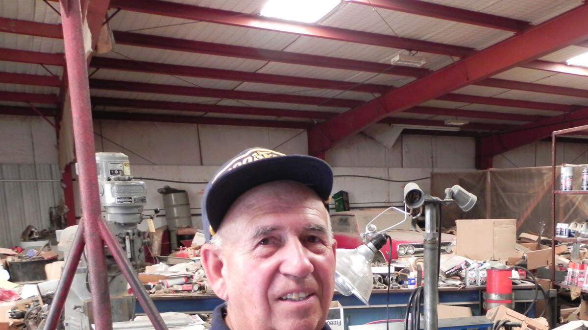Cliff Gottlob, Corvette racer, mechanical engineer at work in his sprawling, artifact-filled Arkansas City shop.                               