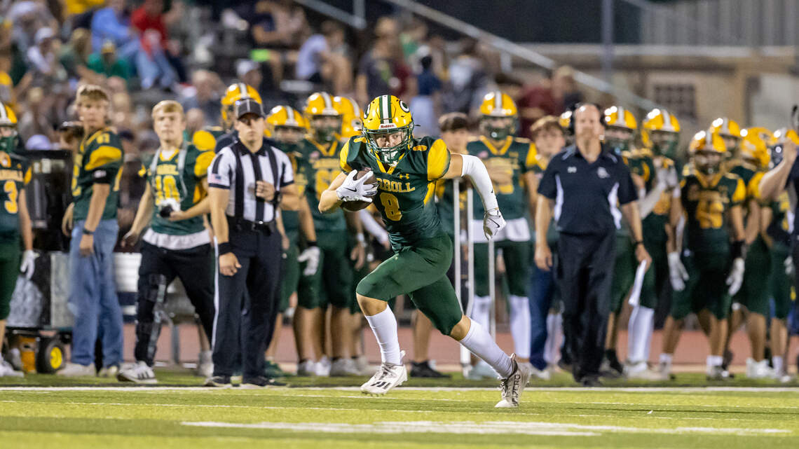 Find Kansas high school football league and district standings following Week 5 games