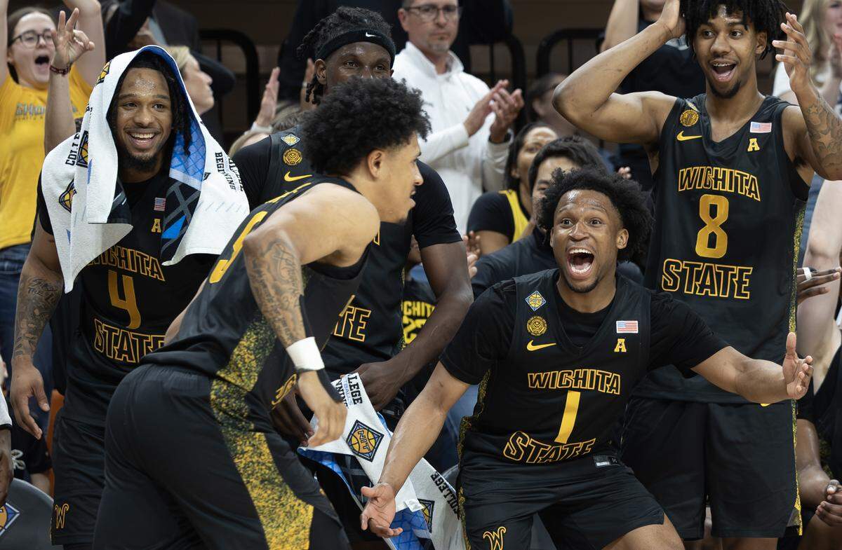 Wichita State’s Kenyon Giles reacts to a three pointer from Michael Gray Jr., late in the second half of their NIT second round game against Oklahoma State on Sunday night in Stillwater.