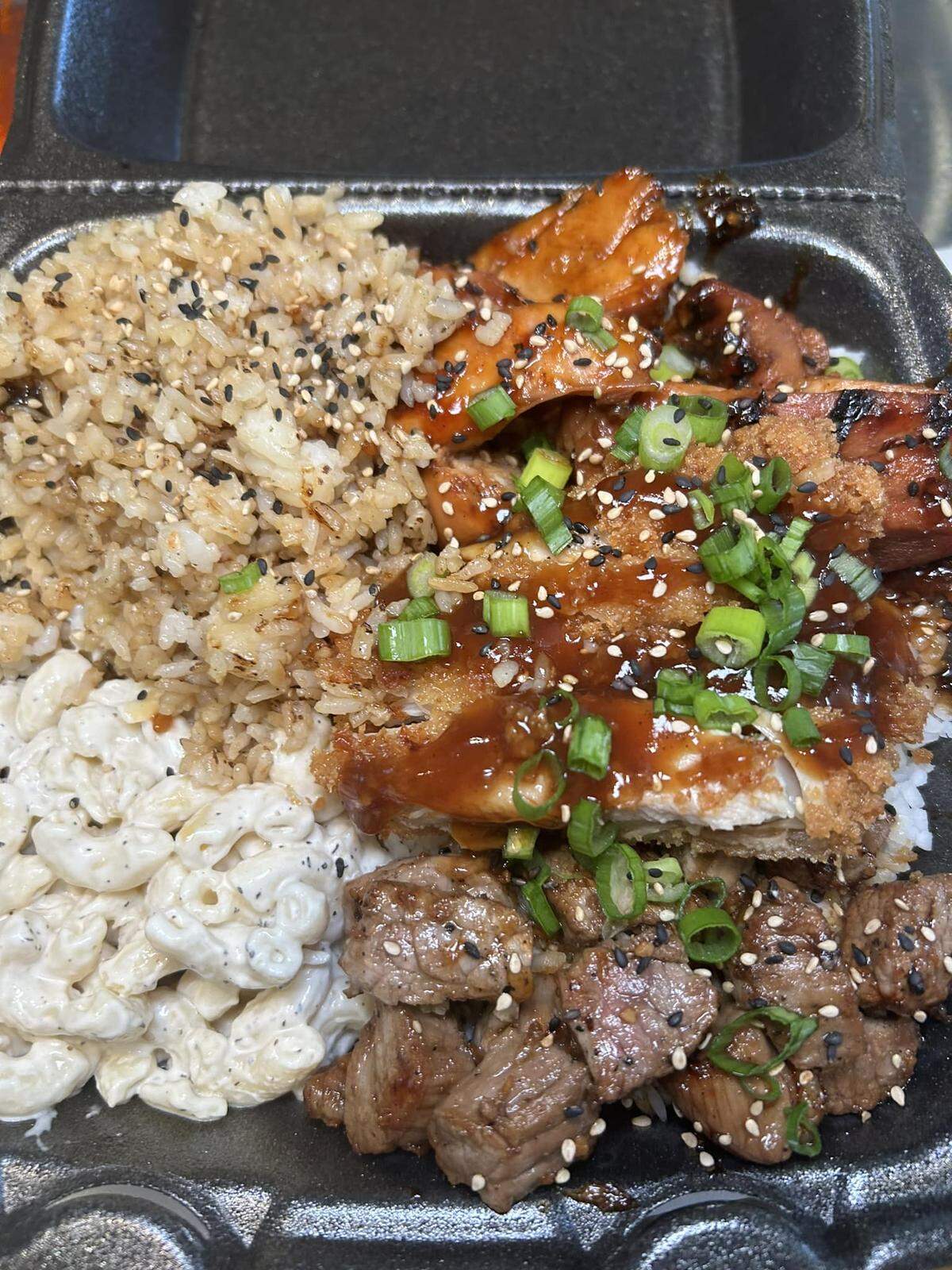 Sharky’s Island Bites, which will replace Crafted at 21st and Webb, serves hot Hawaiian plate lunches, which feature proteins like huli huli chicken plus white rice and macaroni salad.