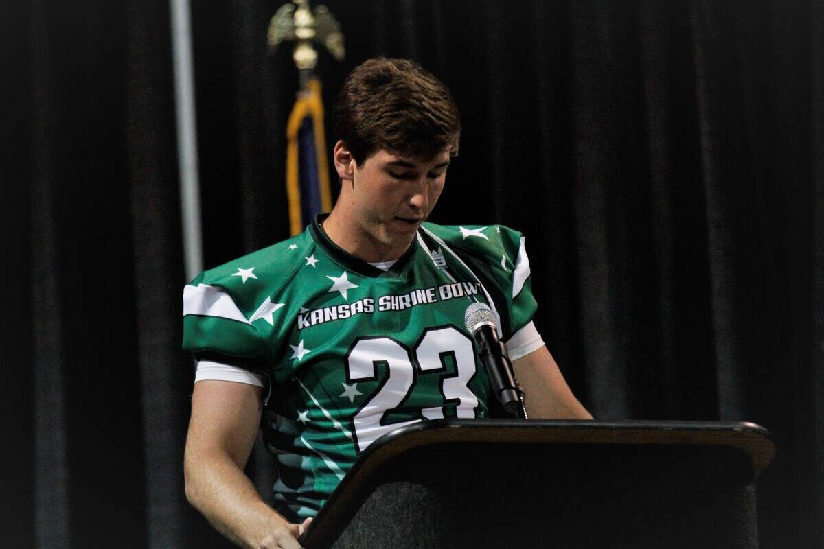 Kapaun Mt. Carmel graduate Scott Valentas speaks for the West Squad at the 2019 Shrine Bowl Player Appreciation Banquet in Dodge City.