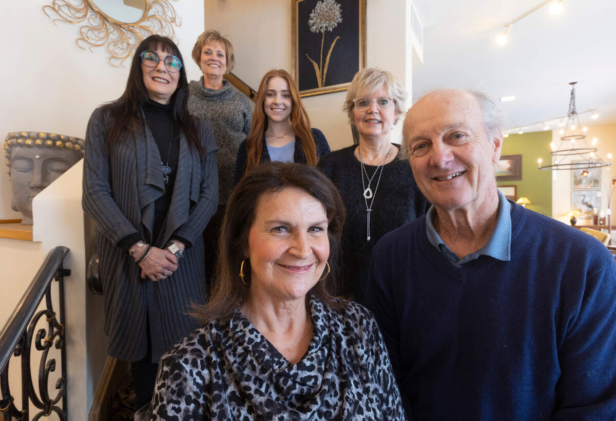 Traditions Home owners Robin Van Huss and Art Davis, front, are retiring and will either sell or close their popular furniture and home decor store near Douglas and Hillside. The Traditions team includes, from left: Dayna Rosencutter, Carol Muller, Alaina Bates and Van Huss’ sister, Diane Fletcher.