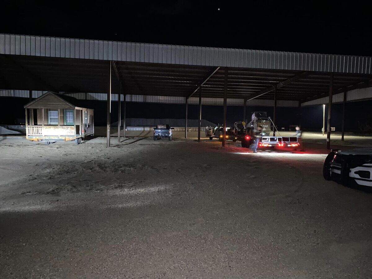 A social media photo by the Hamilton County Sheriff’s Office shows the stolen tiny home along with the trailer and Bobcat skid steer that were recovered Sunday night in Coolidge, Kansas.