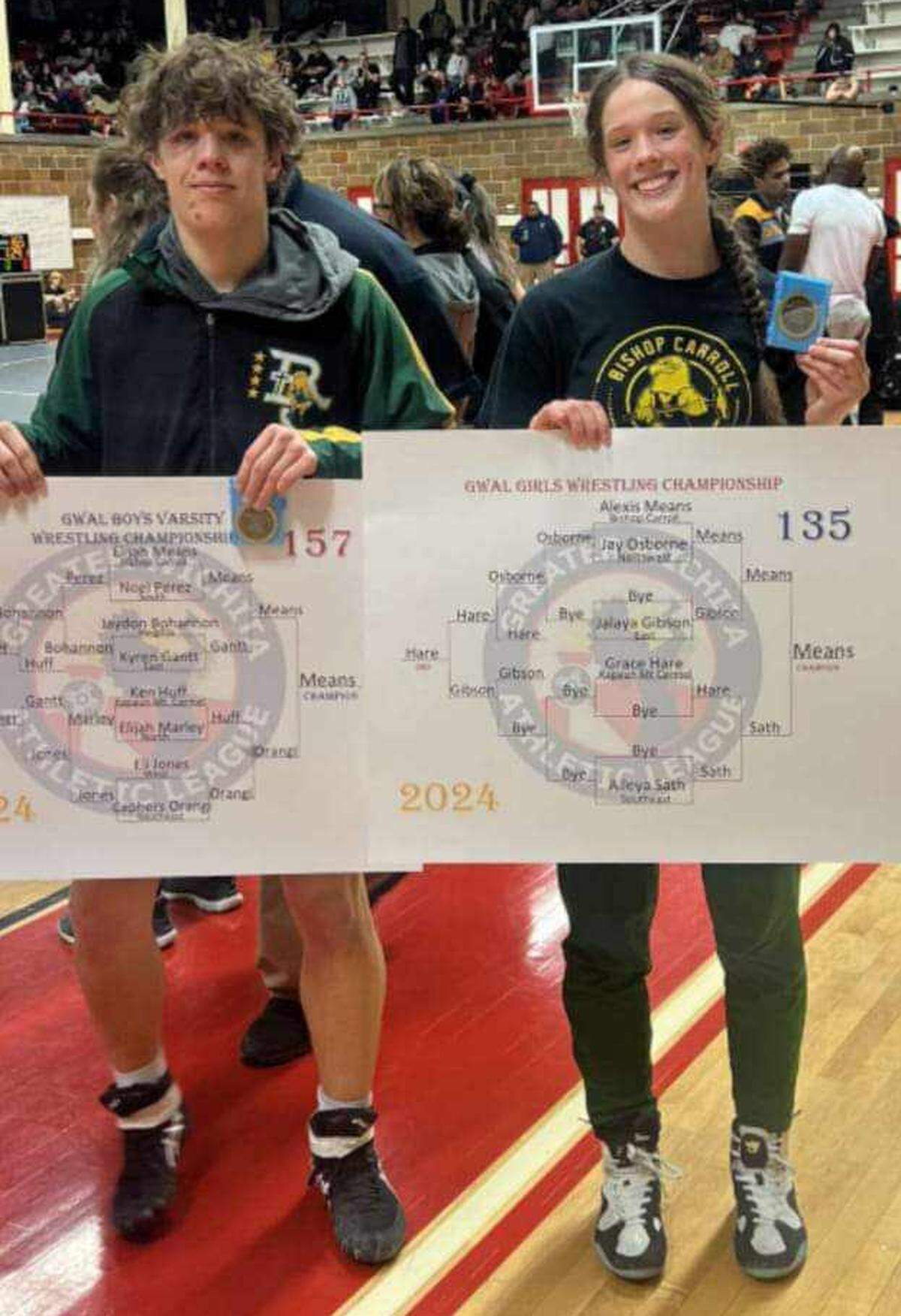 Elijah (left) and Alexis (right) Means are juniors on the Bishop Carroll wrestling team who both won gold medals at the recent City League tournament.