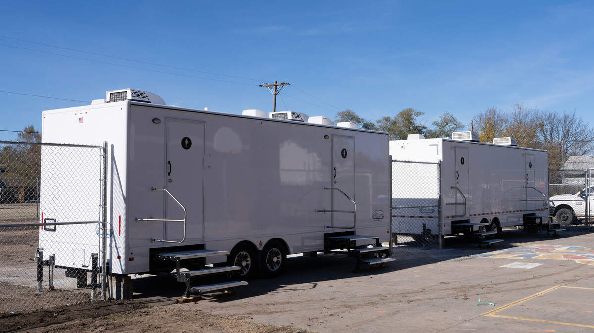 The emergency winter shelter in the former Park Elementary School will open on Dec. 2. Although visitors can use the restrooms that already exist in the building, the city has brought in additional restroom and shower trailers.