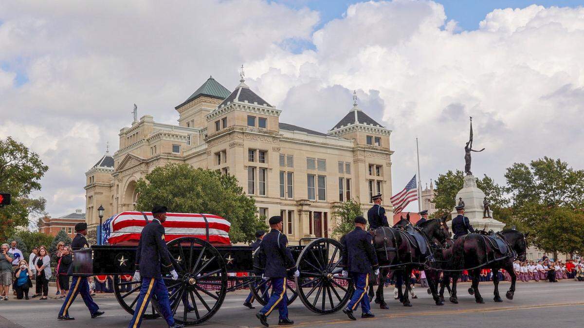Father Emil Kapaun laid to rest in Wichita as thousands pay their respects