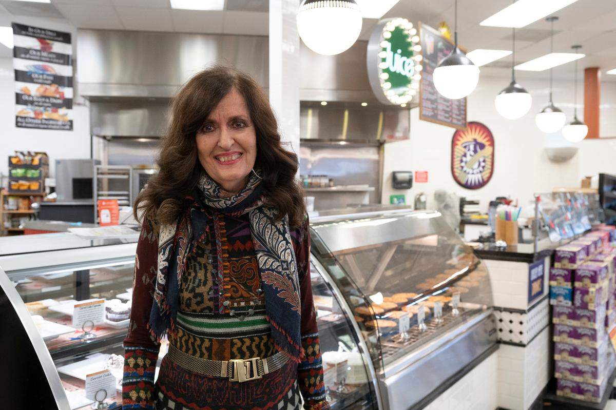 GreenAcres Market owner Barb Hoffmann stands in the deli of the store near 21st and Maize Road. GreenAcres Market is closing its store near 21st and Amidon, which will allow it to build back its deli at the 21st and Maize Road store.