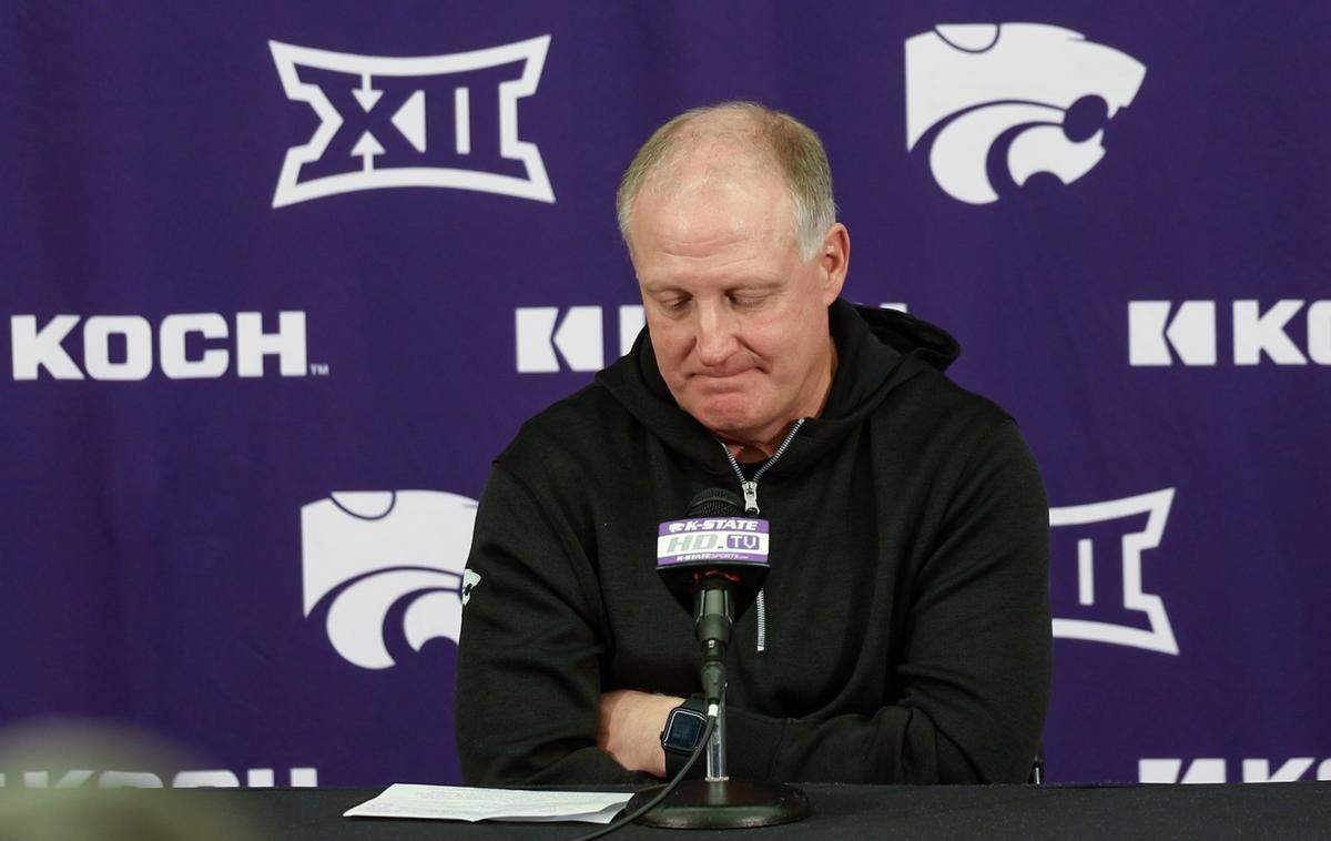 Kansas State football coach Chris Klieman pauses during a news conference to announce his retirement at Bill Snyder Family Stadium on Wednesday, Dec. 3, 2025.
