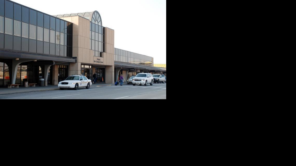 Wichita Mid-Continent Airport was quiet Saturday morning, a day after a man was arrested in connection with a plan to bomb the facility.

