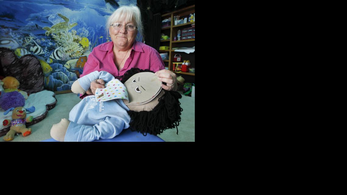 Volunteer Carolyn Kitchens is in the “Ocean Room” at Kidzcope, where she works with 3- to 5-year-olds. Kidzcope is a nonprofit organization that helps children ages 3-18 grieve for friends and family that have died. (April 17, 2014)

