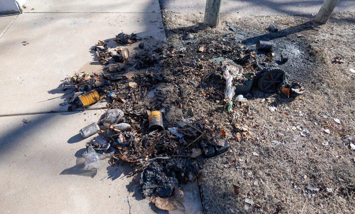 Dismantled pieces of the League 42 Jackie Robinson statue were found in this burned dumpster at Garvey Park in south Wichita on Tuesday morning.