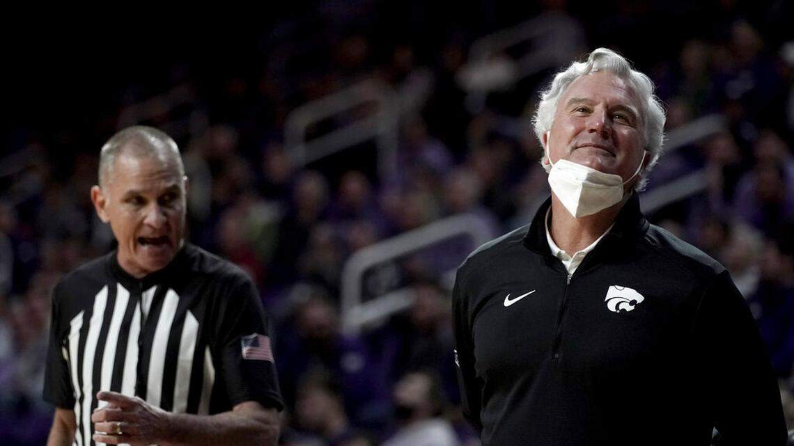 Kansas State head coach Bruce Weber reacts while talking to an official during the first half of an NCAA college basketball game against Iowa State Saturday, Feb. 26, 2022, in Manhattan, Kan. (AP Photo/Charlie Riedel)