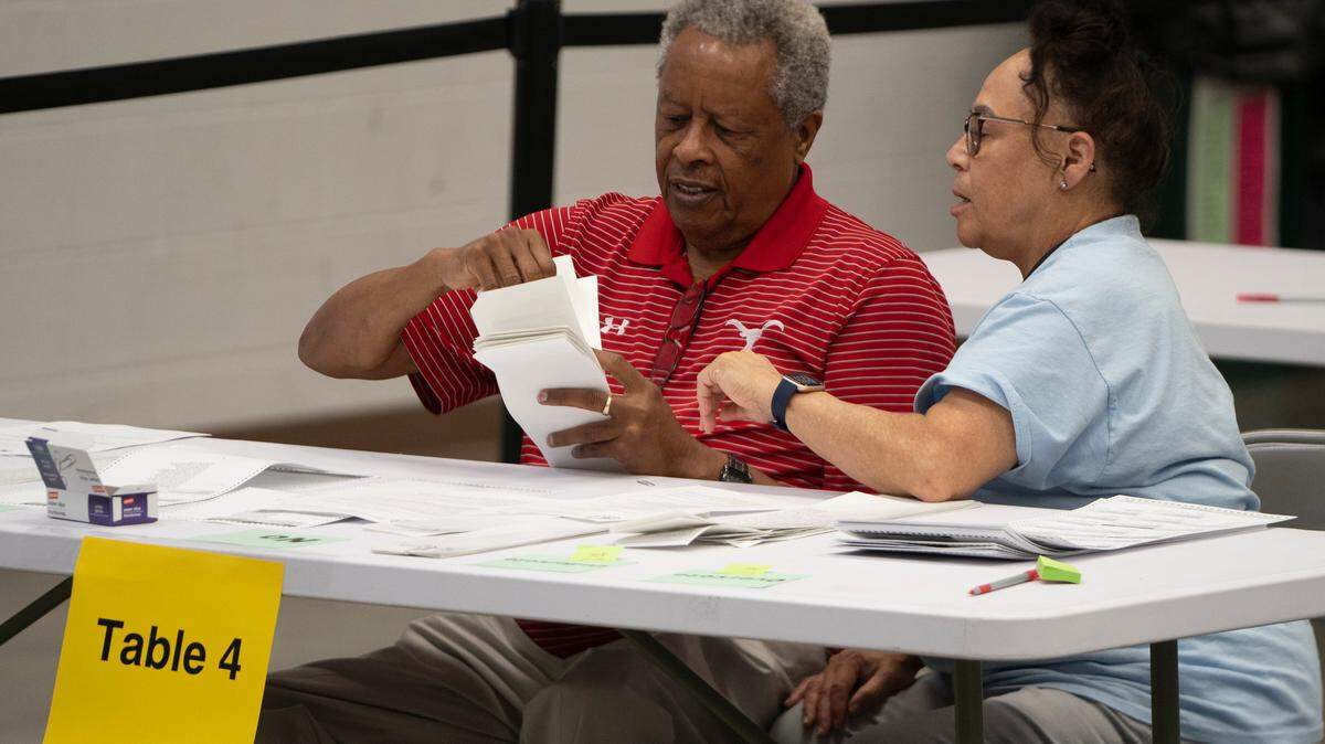 Bipartisan counting teams prepare to recount nearly 150,000 ballots at the Sedgwick County Extension Center on a constitutional amendment that would’ve removed abortion rights from the Kansas Constitution.