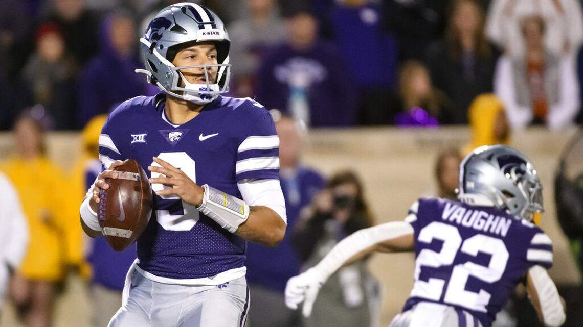 Kansas State quarterback Adrian Martinez (9) looks to throw against Texas during the first half of an NCAA college football game Saturday, Nov. 5, 2022, in Manhattan, Kan. (AP Photo/Reed Hoffmann)