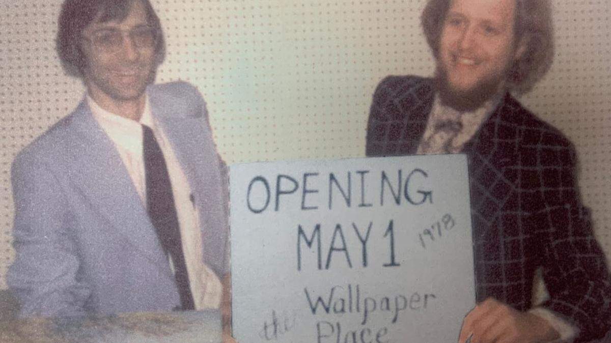 Bill Little, right, and Gary Fry are wanting to sell their 44-year-old Accent Interiors at the Wallpaper Place. This is a photo of them as they prepared to open in May 1978.