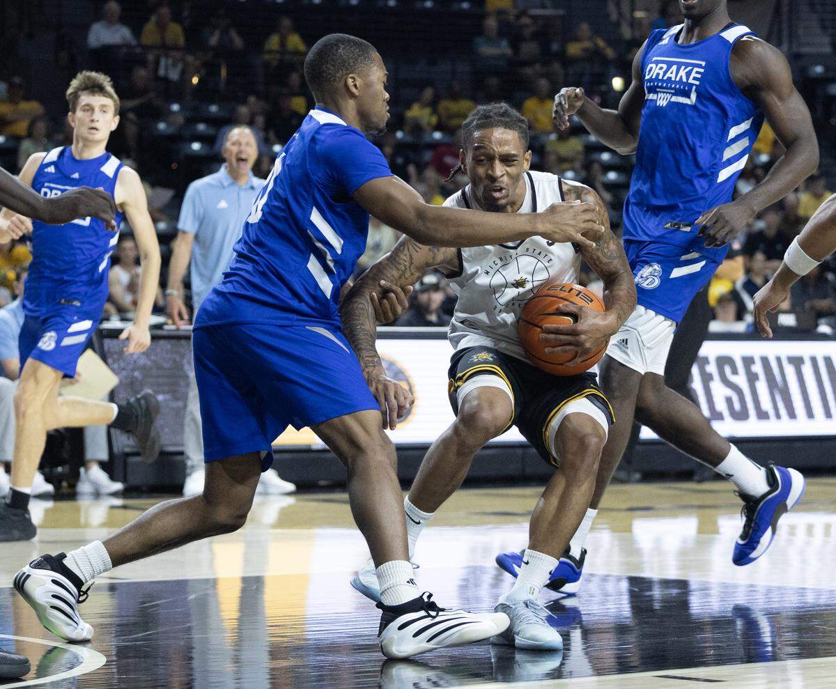 Wichita State point guard Dre Kindell drives the paint against Drake in a scrimmage at Koch Arena.