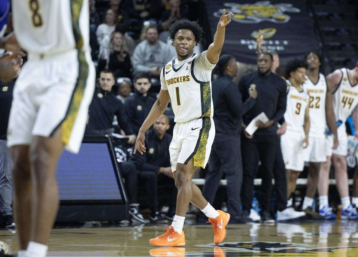 Wichita State’s Kenyon Giles celebrates a three pointer in the first half against Prairie View A&M on Saturday at Koch Arena.