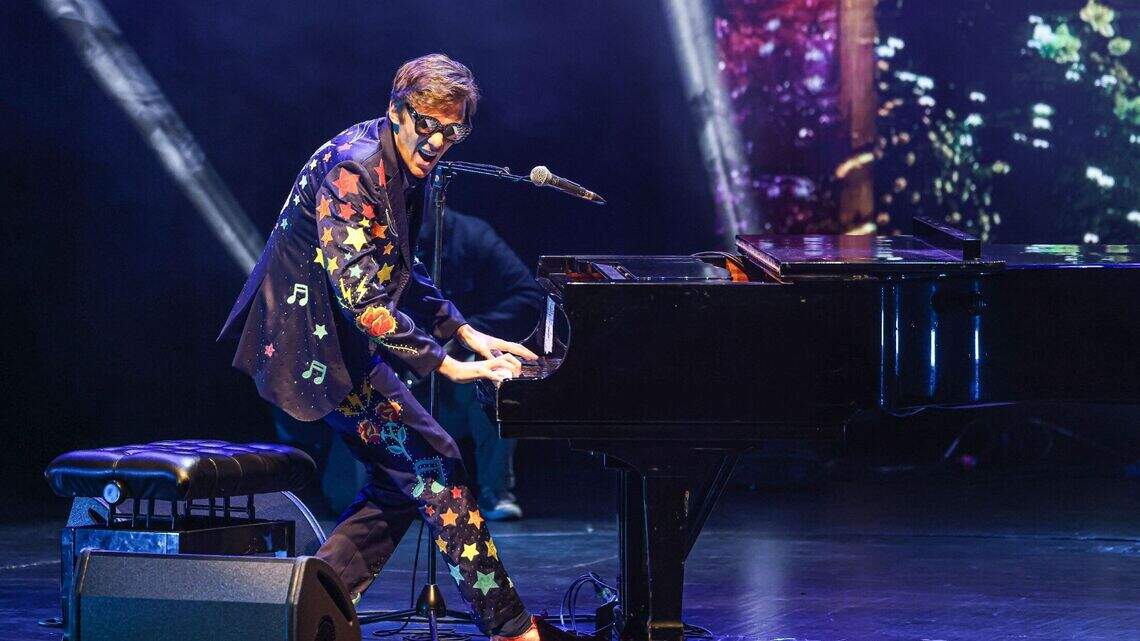 Playing Elton John is a mission for fashion designer/singer