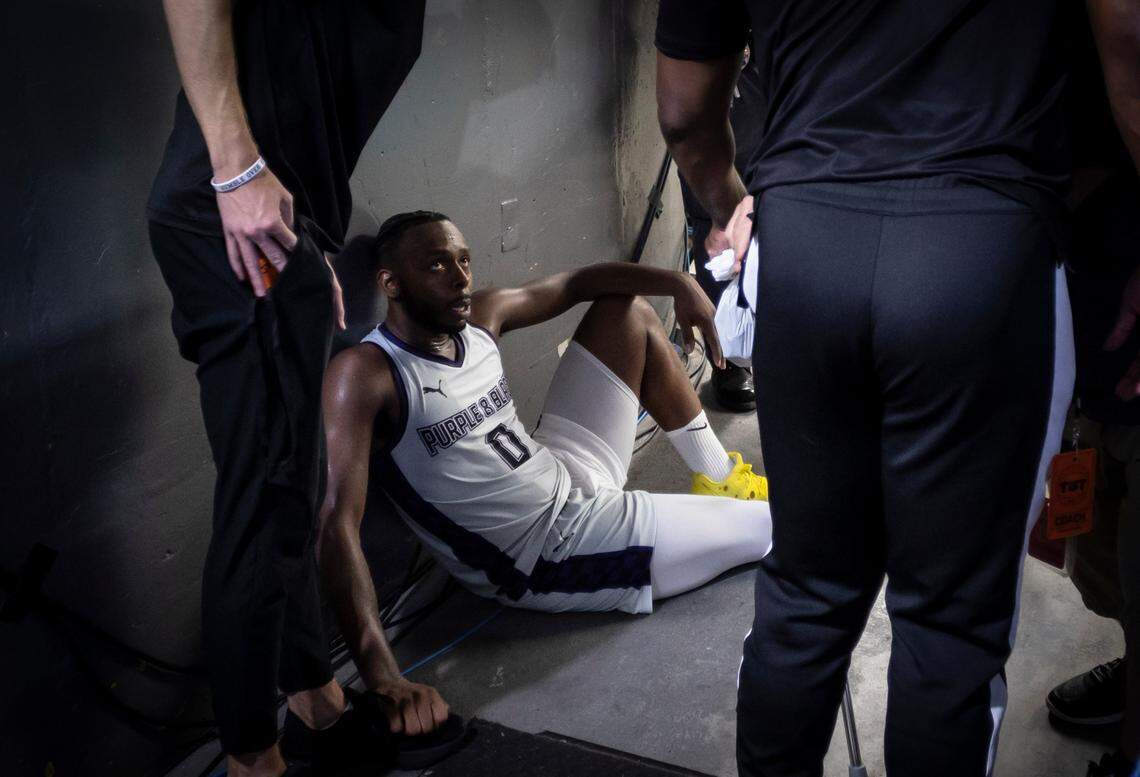 Jacob Pullen sits exhausted in the tunnel just off the court  after he hit a three-pointer against the Lone Star Legends to advance in The Basketball Tournament at Koch Arena on Friday night.