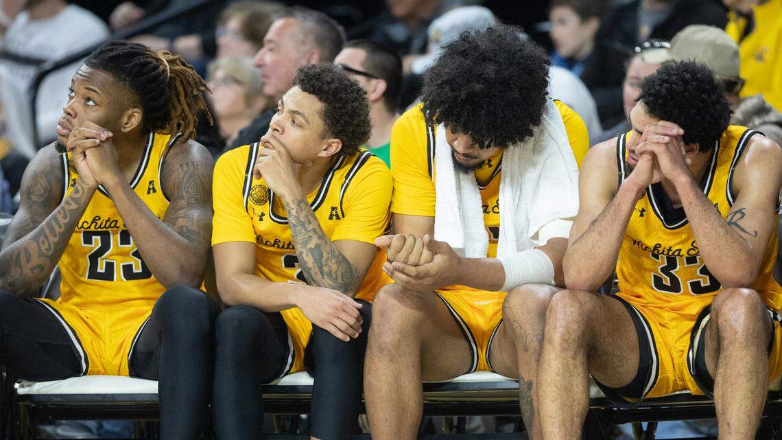 Wichita State state players sit dejected on the bench as the fall to East Carolina by 10 on Saturday at Koch Arena.