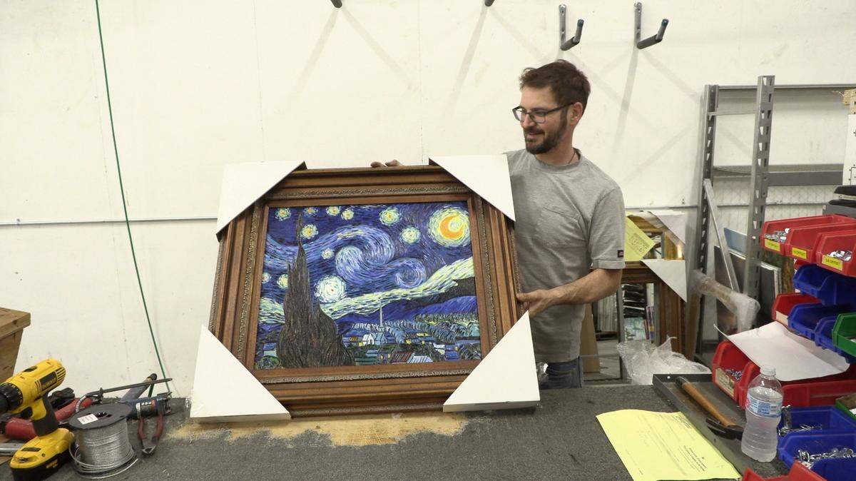 In this 2021 file photo, Overstock Art production manager Adam Simpson finished assembling a reproduction of Vincent van Gogh’s “Starry Night” in the company’s new Hoover Road headquarters. Now, company owner David Sasson has filed for Chapter 7 bankruptcy.