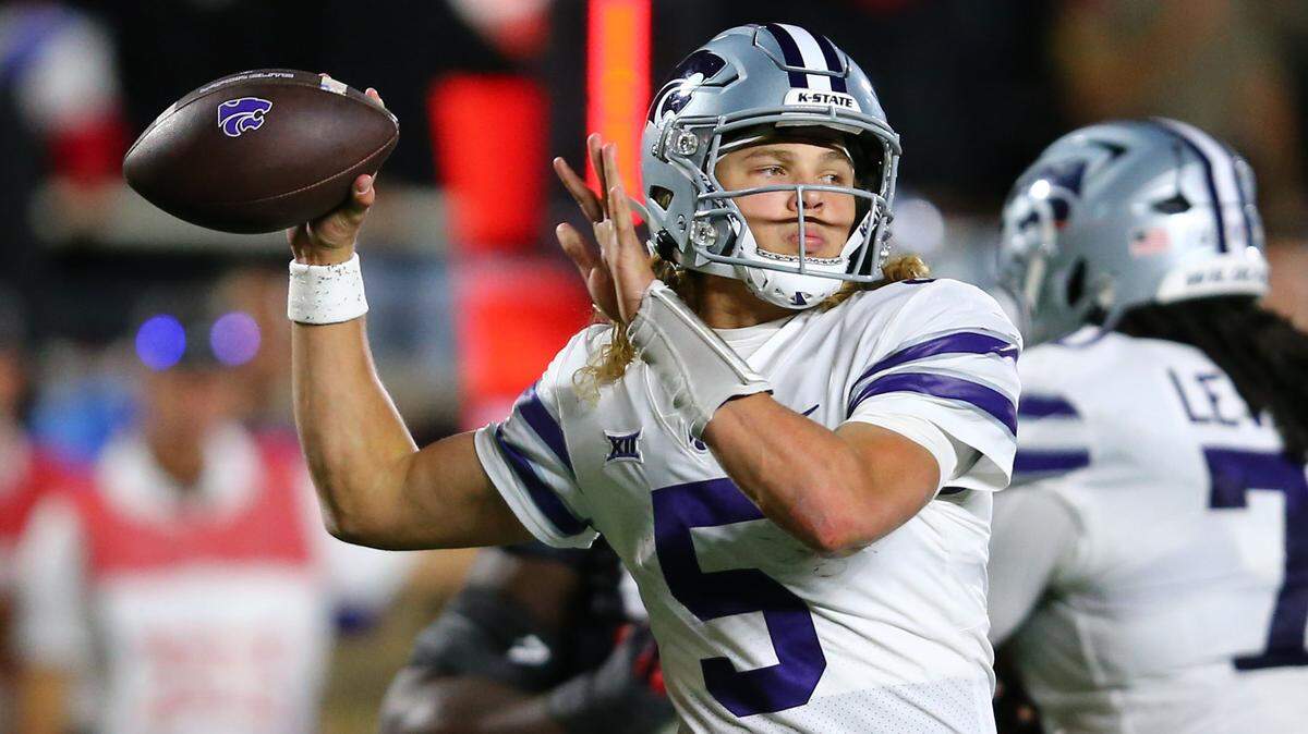 Kansas State Wildcats quarterback Avery Johnson (5) passes in the second half against the Texas Tech Red Raiders at Jones AT&T Stadium and Cody Campbell Field.