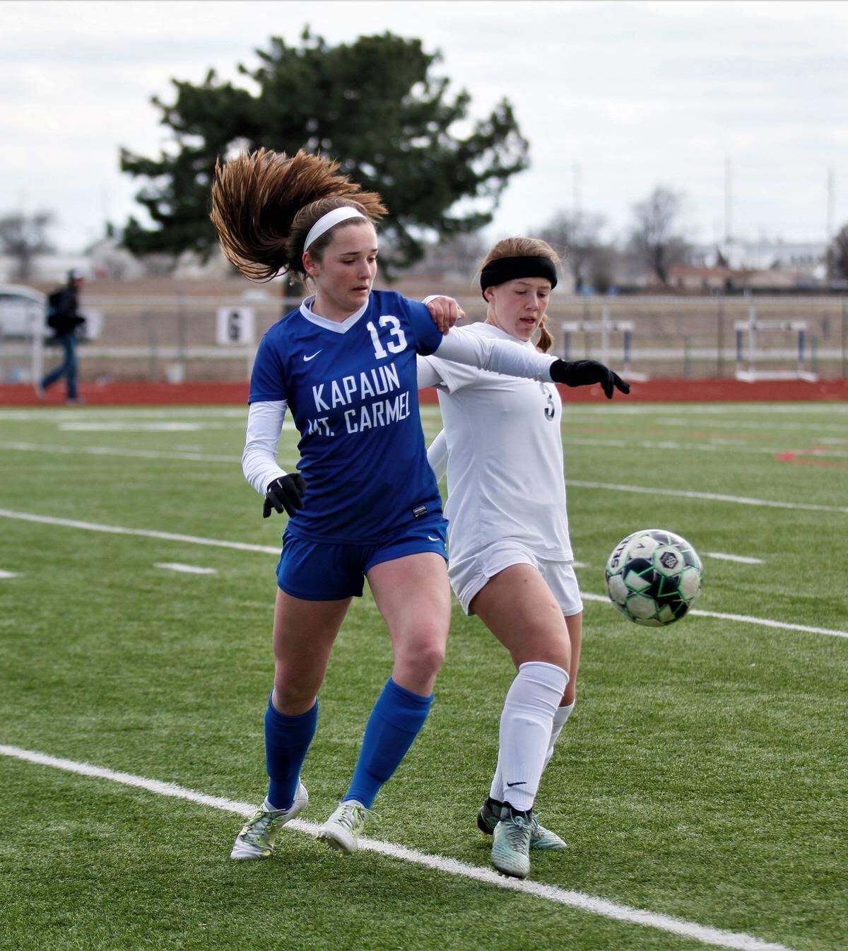 Kapaun’s Hadlie Lowe and Bishop Carroll’s Paige Stranghoner
