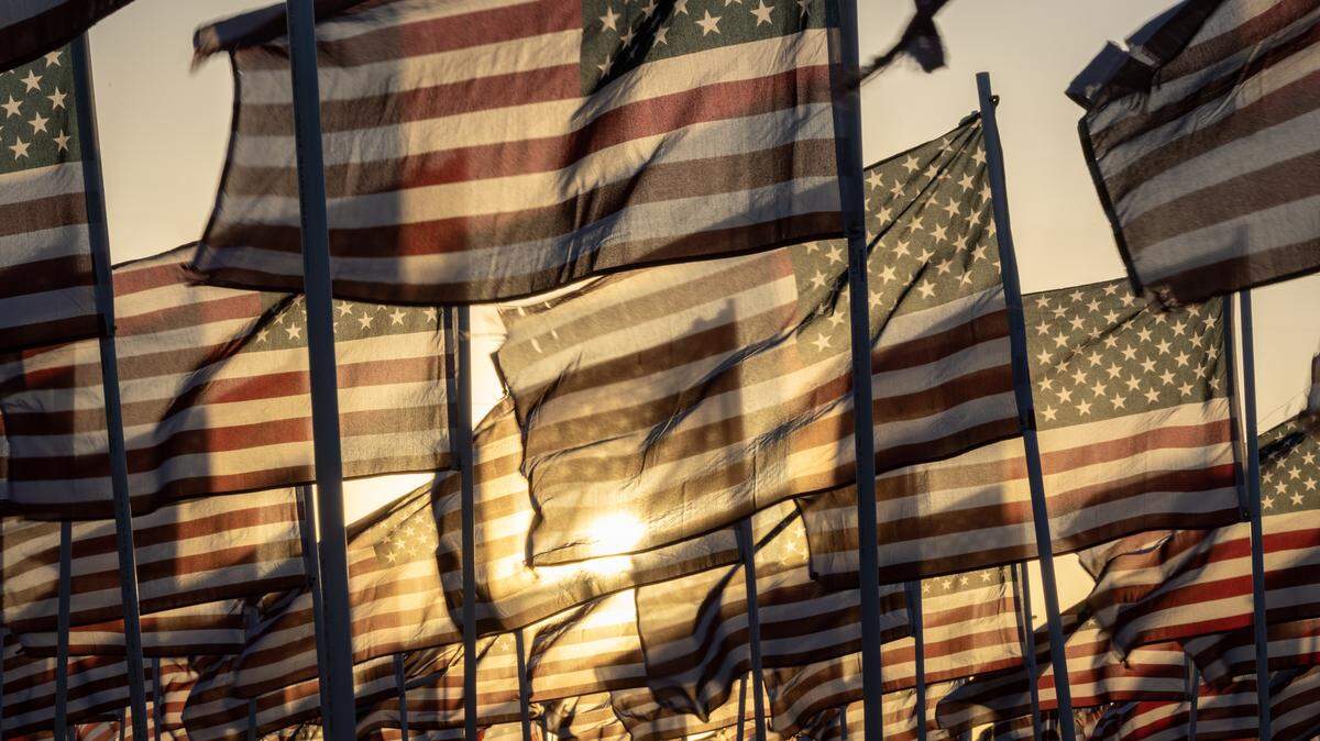 A field of American flags on display at the Machinist Union near I-235 and south Meridian blow in the wind in 2025. The display is placed every year to commemorate Memorial Day.