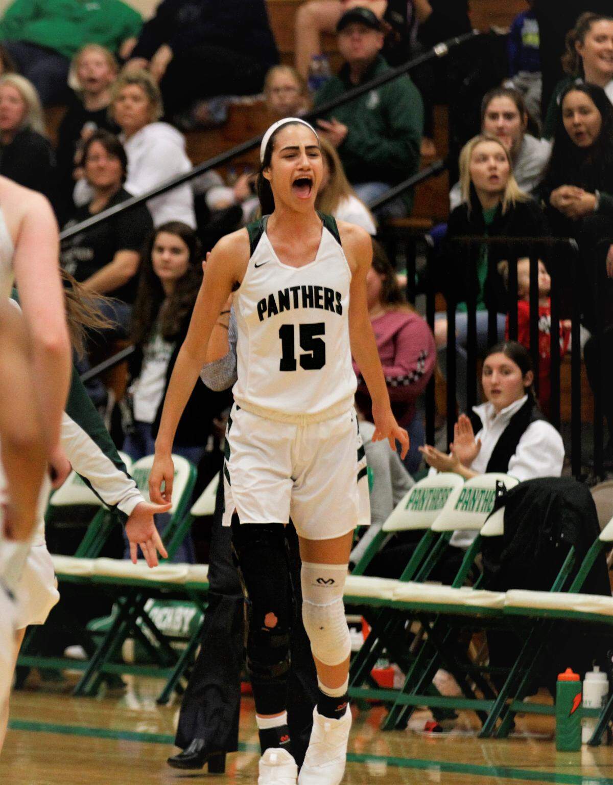 Derby sophomore forward Jaidyn Schomp lets out a yell during the Panthers’ 66-52 win over Wichita Heights on day one of the AVCTL/GWAL Challenge. (Jan. 10, 2019)