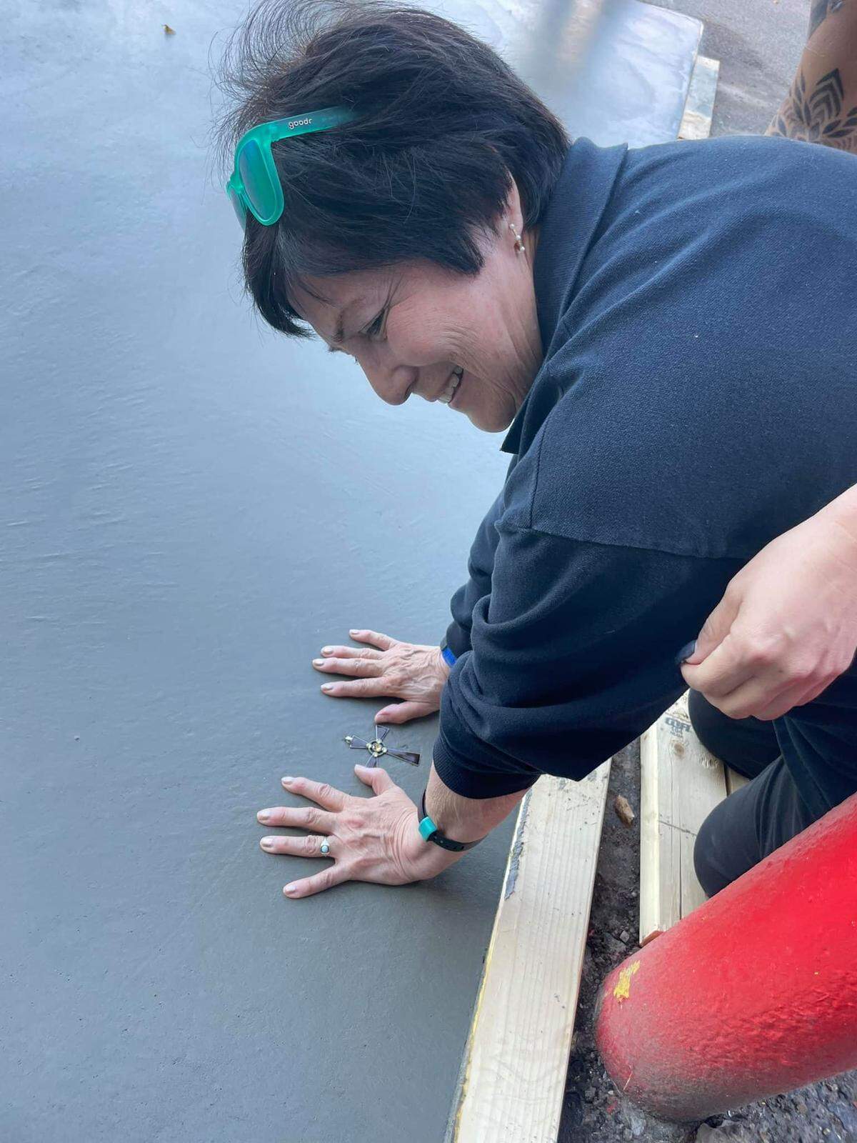 Carmen Rosales, owner of Connie’s Mexico Cafe and the daughter of its founders, Ralph and Connie Lopez, added her palm prints to the restaurant’s new patio.