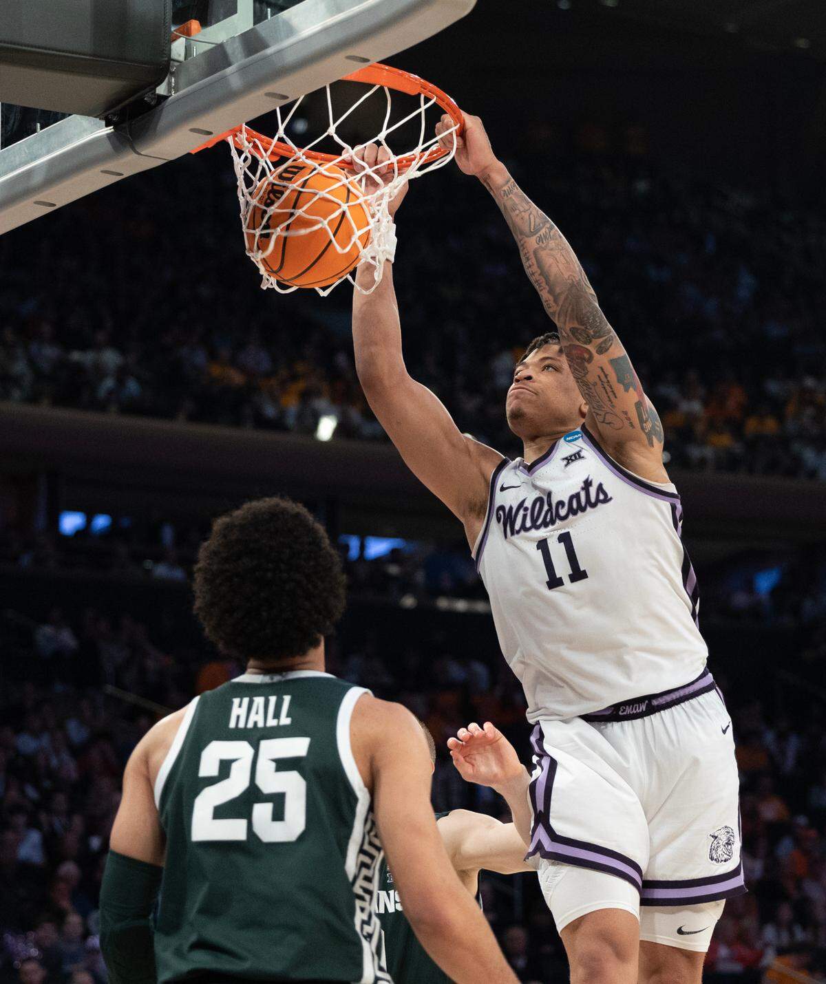 Kansas State’s Keyontae Johnson dunks the ball during the second half of their east region semifinal game against Michigan State at Madison Square Garden on Thursday night.