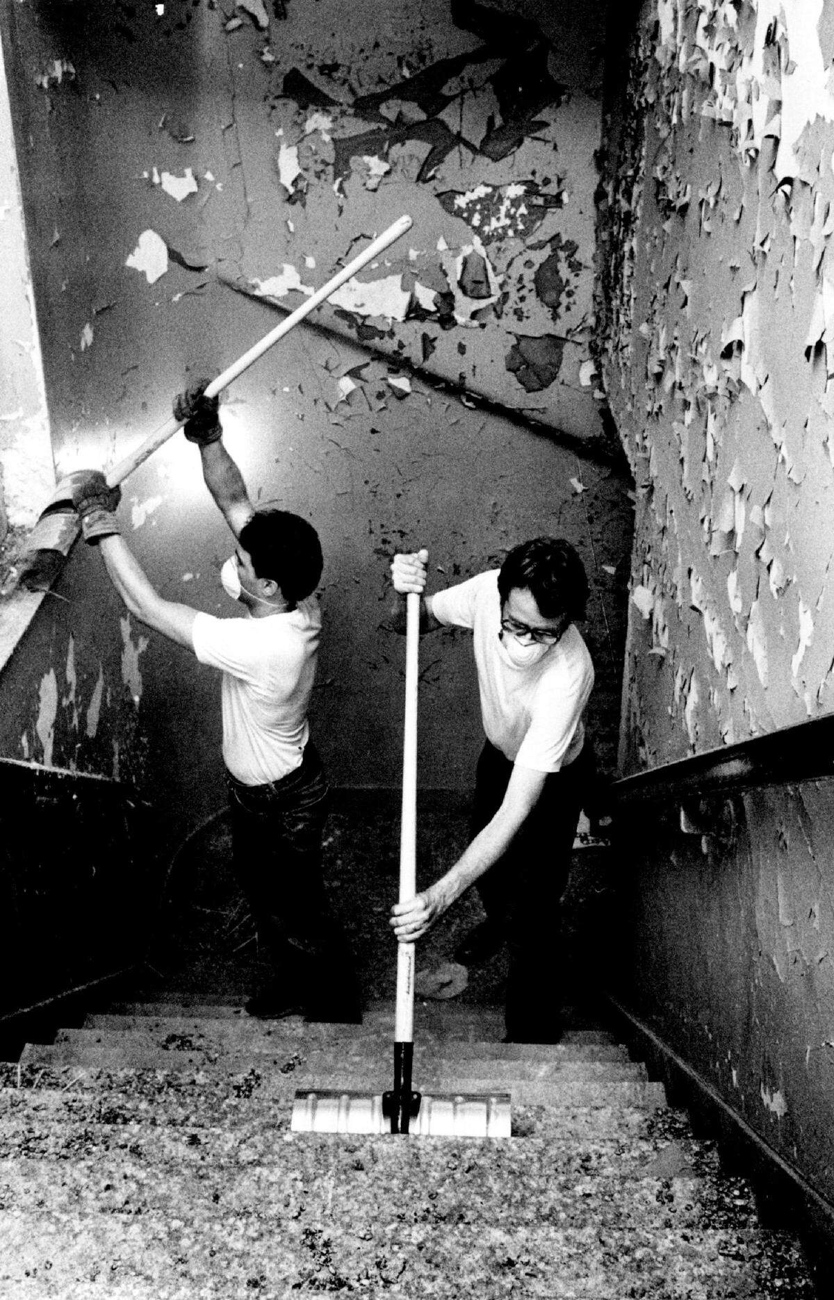 Volunteers work to clean up the interior of the Orpheum Theatre in the 1980’s.