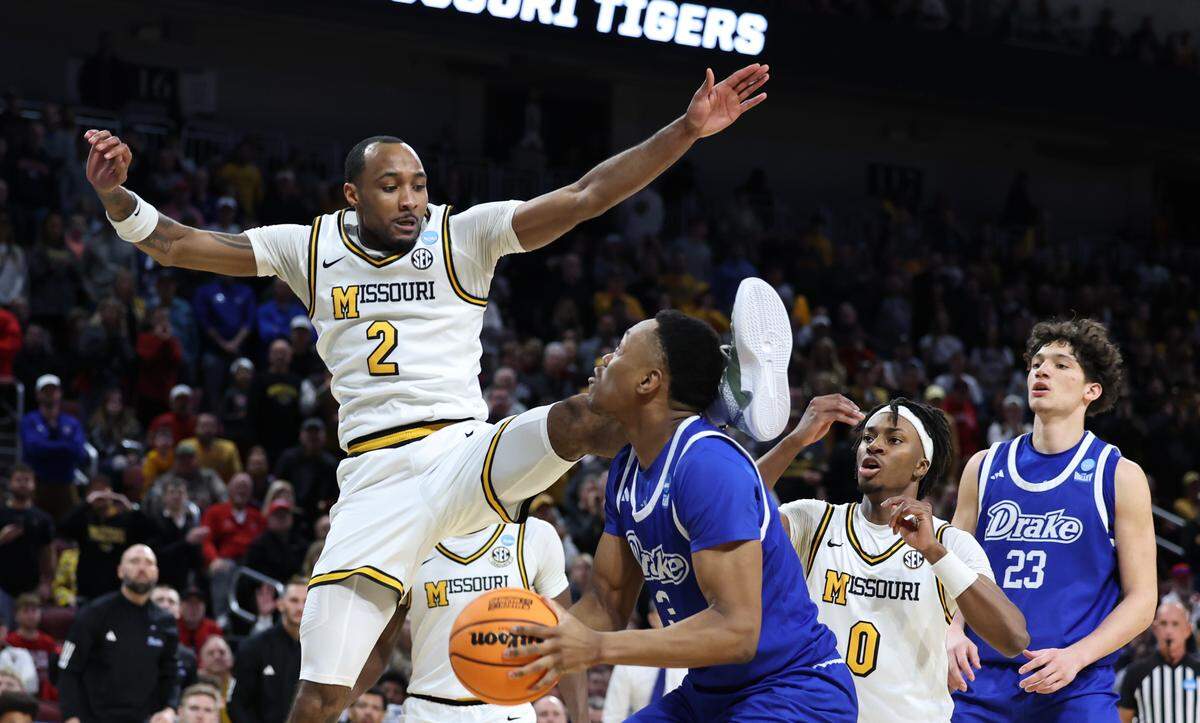 Missouri guard Tamar Bates tries to defend Drake forward Cam Manyawu during the second half of their NCAA Tournament game in Wichita on Thursday, March 20, 2025.