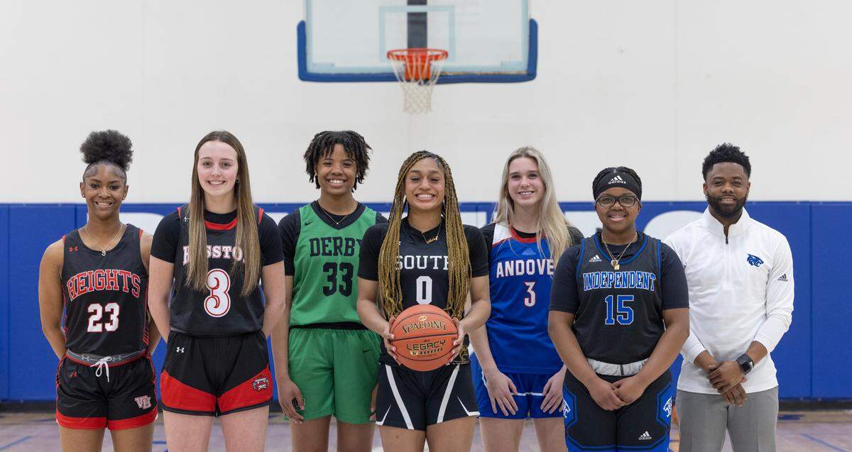 The 2024 Wichita Eagle All-Metro team for girls basketball. From left to right: Heights’ SaMiyah Ellis, Hesston’s Kendal Brueggen, Derby’s Macayla Askew, Maize South’s Ashley Singhateh, Andover’s Brooke Walker, Independent’s Zoey Buckner-Franklin and Independent coach EJ Garnes.
