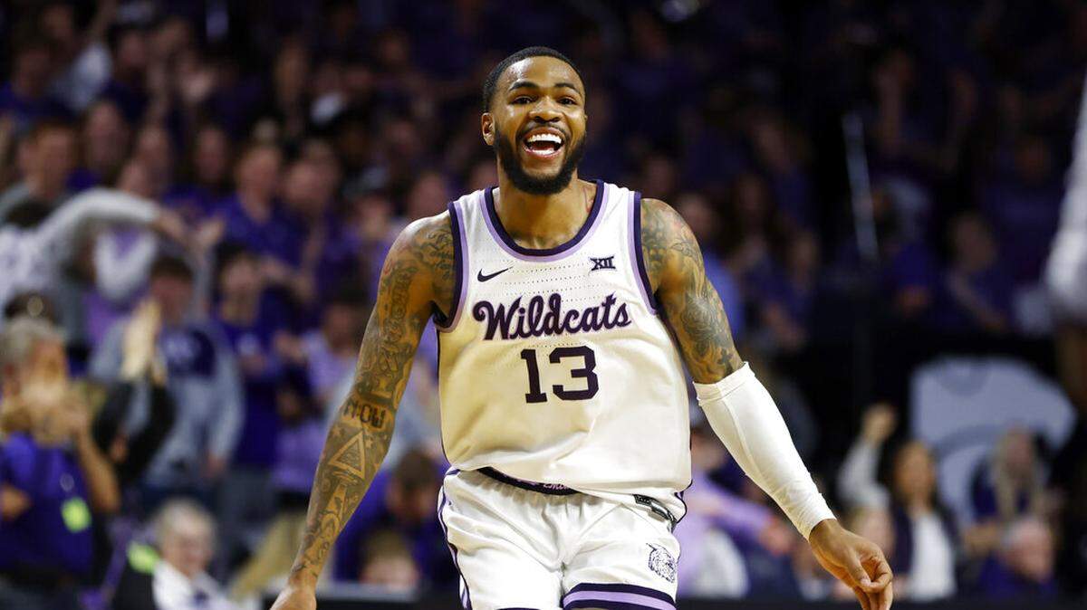 Kansas State guard Desi Sills celebrates as a timeout is called by Baylor after the Wildcats went on a scoring run during the second half on Tuesday, Feb. 21, 2023, in Manhattan, Kan.