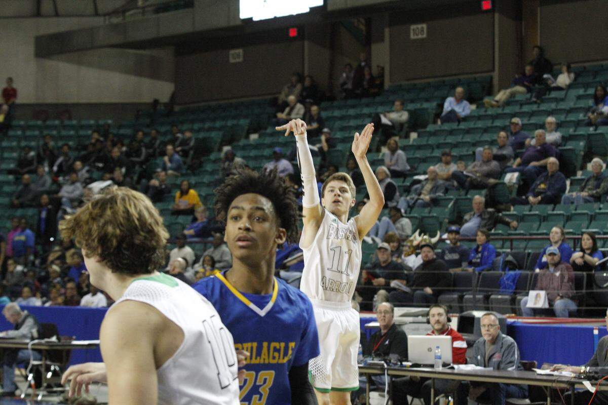 Carroll junior point guard Carsen Pracht hit a three-pointer in the Eagles' 68-57 victory over Schlagle on Wednesday in the Class 5A boys basketball tournament at the Kansas Expocentre in Topeka.