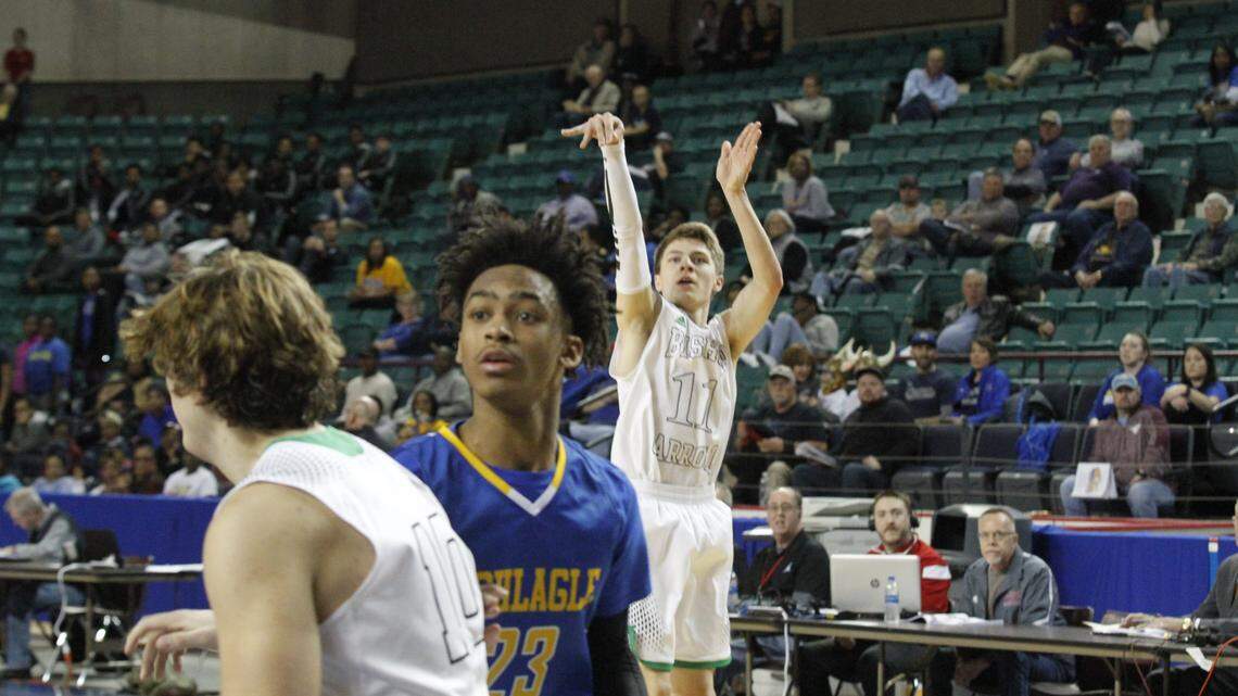 Carroll junior point guard Carsen Pracht hit a three-pointer in the Eagles' 68-57 victory over Schlagle on Wednesday in the Class 5A boys basketball tournament at the Kansas Expocentre in Topeka.