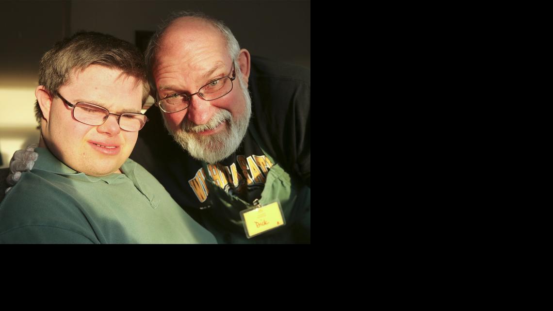 Dick Rader, right, and his son Sammy, 20, have volunteered at the Lord’s Diner for years. 

