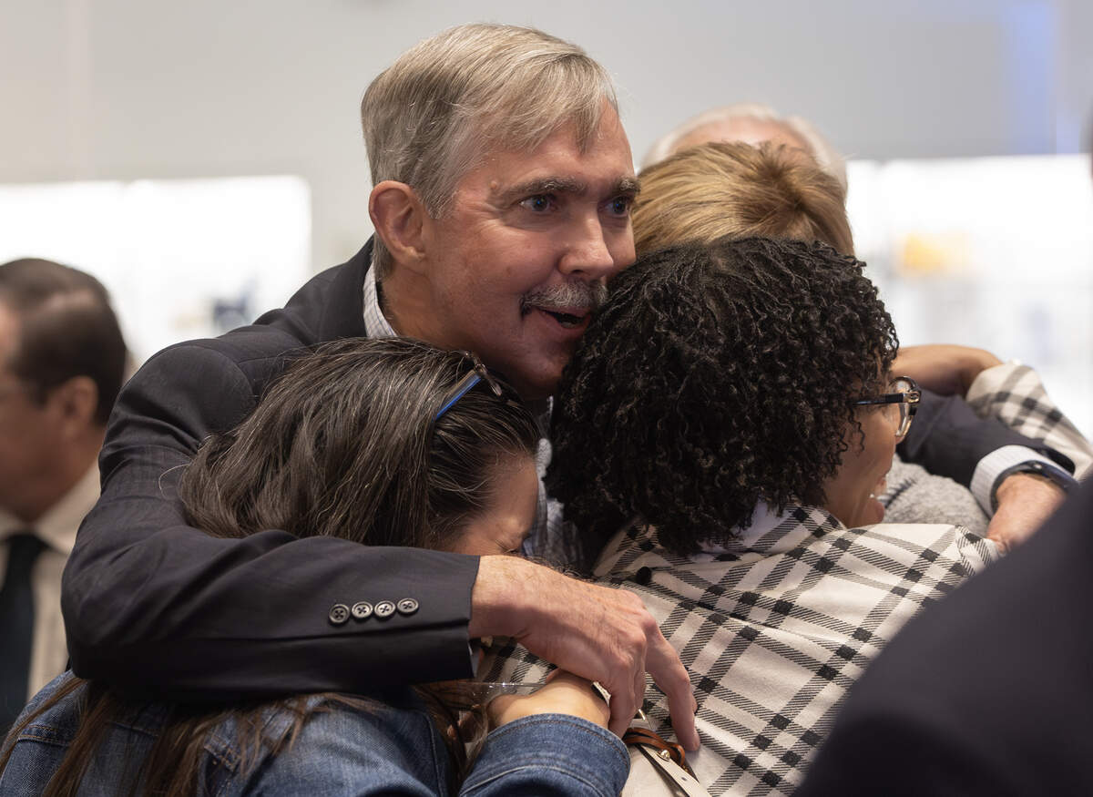 Wichita City Manager Robert Layton is greeted by visitors during a reception for him at the Wichita Art Museum.