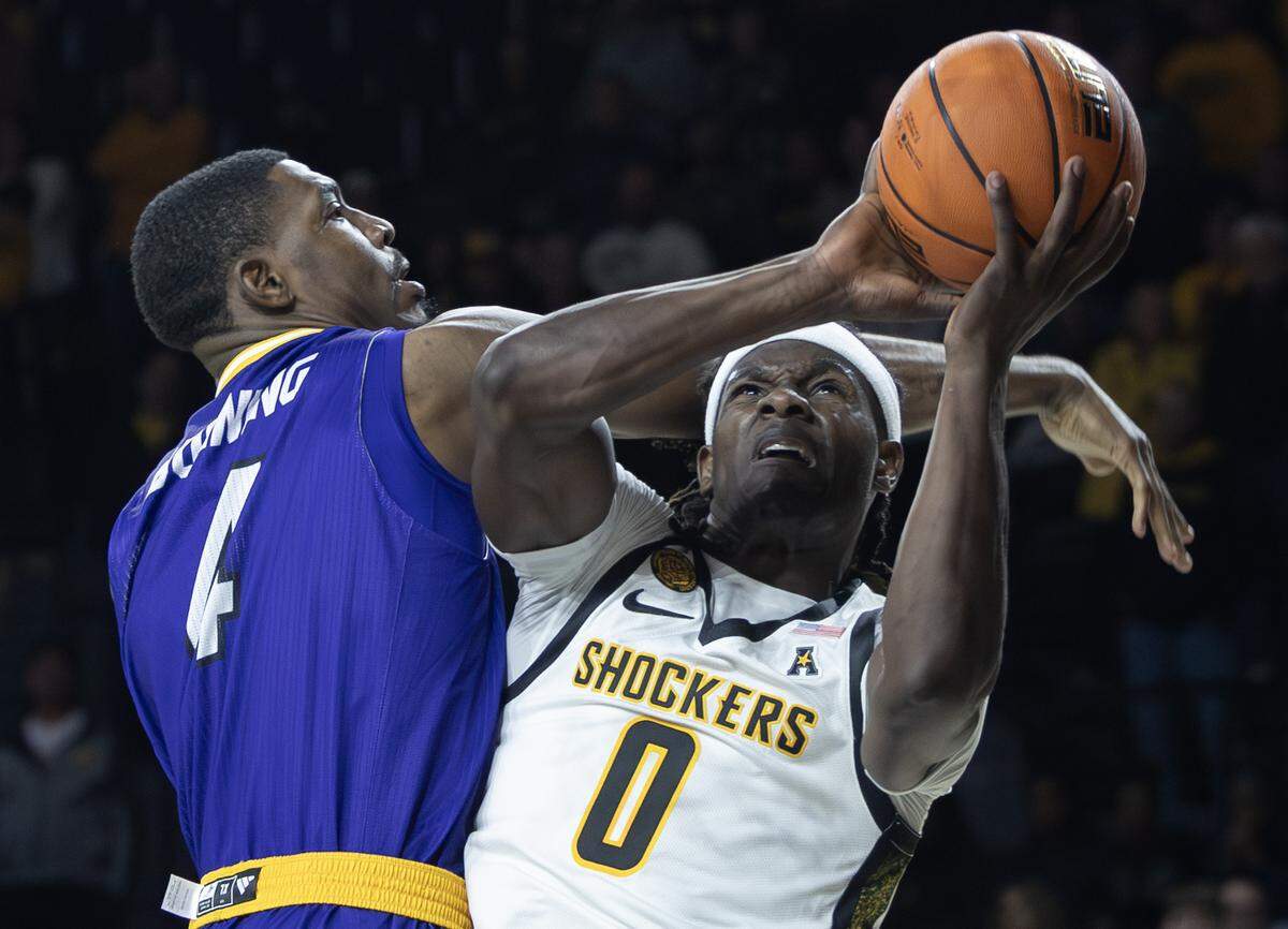 Wichita State’s Karon Boyd fights his way to the basket during the second half against Prairie View A&M on Saturday at Koch Arena.