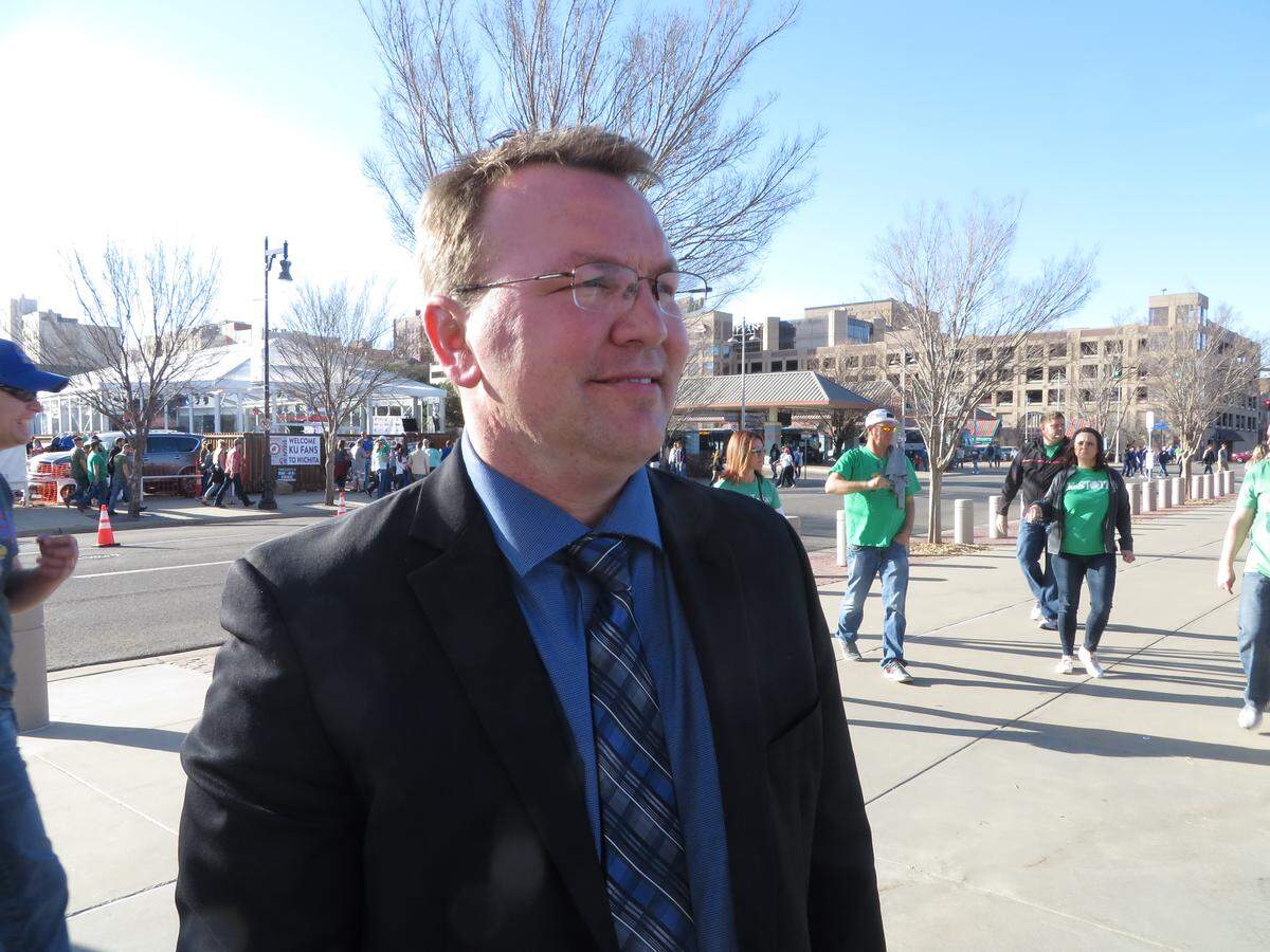 Intrust Bank Arena manager A.J. Boleski wasn't watching the game. He was minding the door.