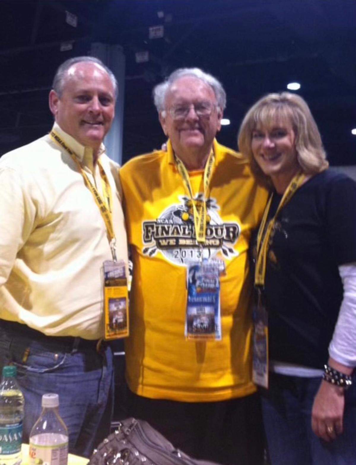 Jim Rhatigan, center, with his only child, Becky Linot, and her husband, Joe Linot.