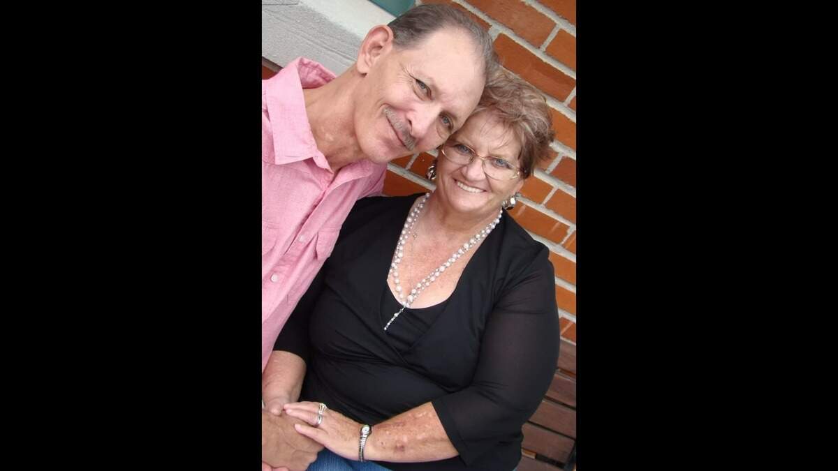Jim and Kathy Moore pose for a photo in 2013. The couple was trapped in their home Friday in rural Sedgwick County after it took a direct hit from a tornado. Jim was eventually able to get free and then pull the debris from his wife.