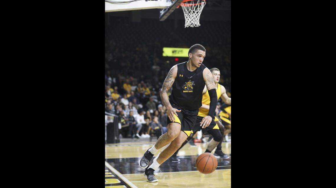 Wichita State Shockers forward Teddy Allen drives the baseline after getting a rebound during the Black and Yellow Scrimmage in Koch Arena. (Oct. 6, 2018)