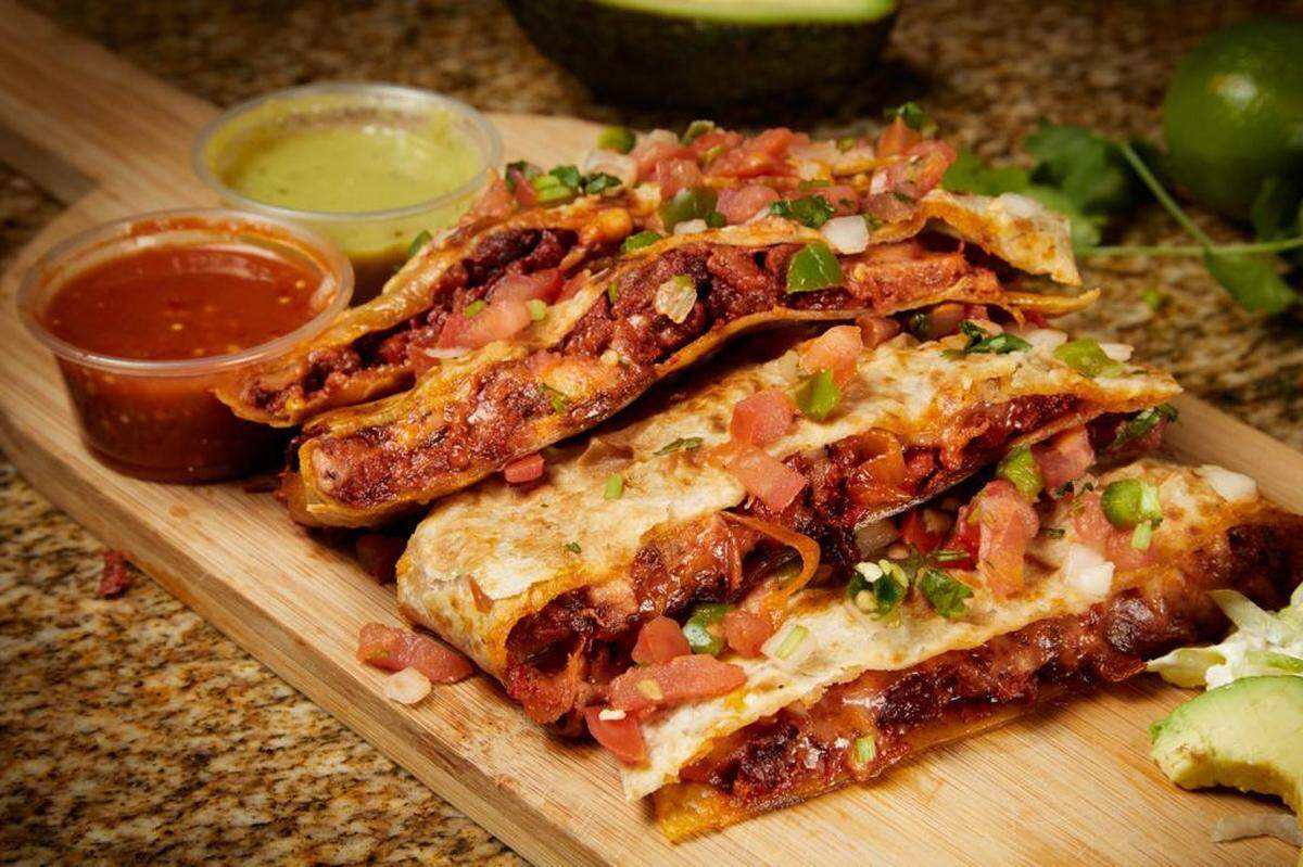 Quesadillas, tacos, burritos and whole grilled chickens are among the items being sold at a new El Rio Bravo food truck, opening outside the popular Wichita supermarket.