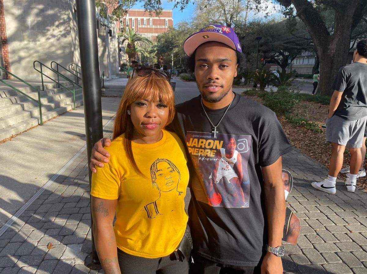 Lorraine Thomas (left) and Calvin Taylor (right) are Jaron Pierre’s mother and brother and were in attendance for Wichita State’s win at Tulane on Sunday. Pierre finished with a season-high 28 points.