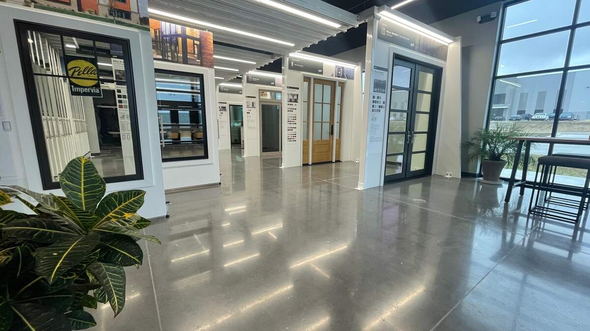 Pella Windows & Doors of Kansas has a new headquarters and showroom near 37th and Webb Road. President Jim Knight said the new space is as clean and sleek as an Apple store.