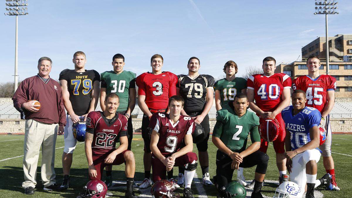 2013 Top 11 football team front row Buhler's Riley Allen, Silver Lake's Dailin Kruger, Derby's Jose Delgado and Gardner-Edgerton's Trae Wrench, Back row: Buhler Caoch Steve Warner, Olathe South's Braden Smith, Derby's DeAndre Goolsby, Blue Valley West's Ryan Ralston, Blue Valley's AJ Harris, Salina South's Zach Nachbar, Hiawatha's Petyon Newell and Bishop Miege's Brad Ivey. (December 3, 2013)