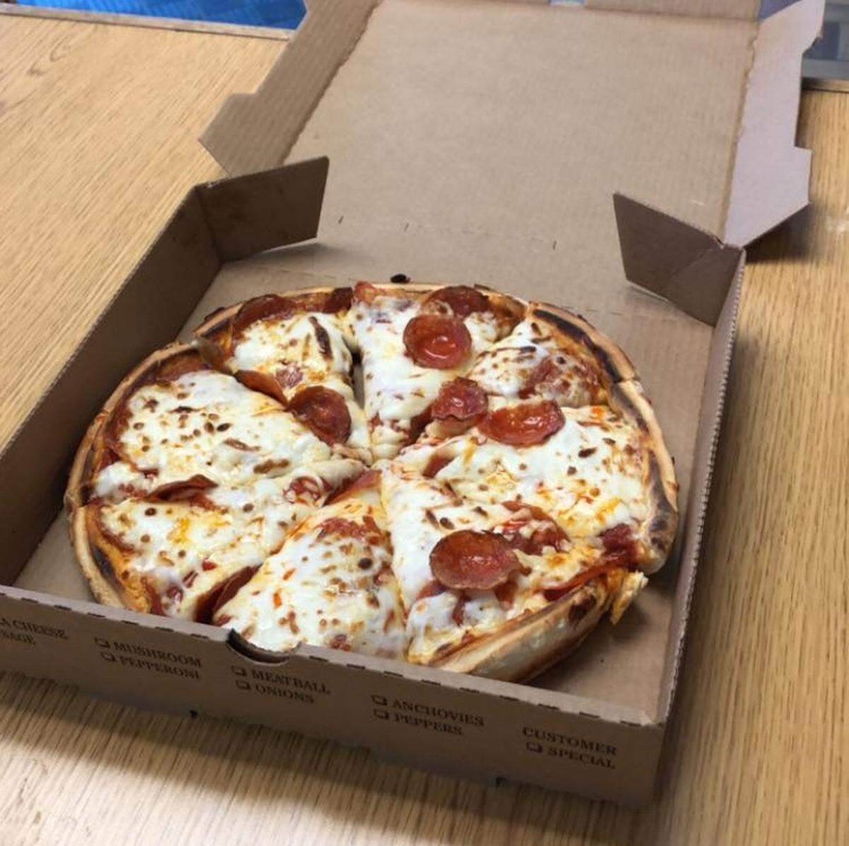 Po Boy Pizza specializes in pizza rolls and pizza pies.