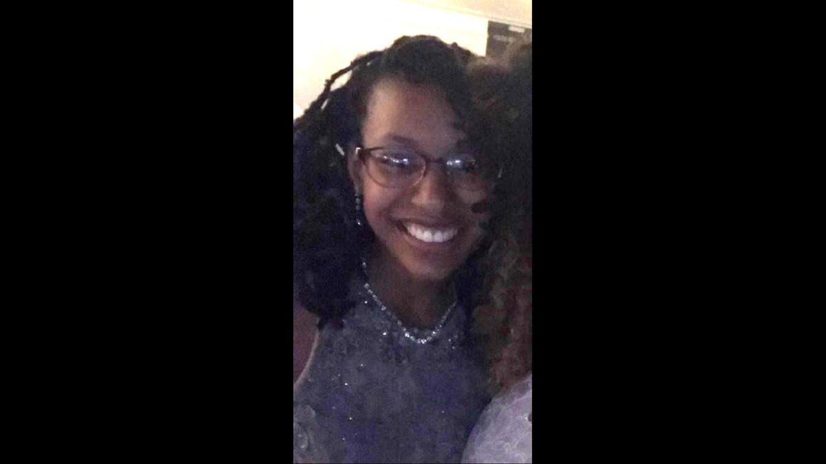 Deniq Ingram posing after getting dressed up for prom in 2018.
